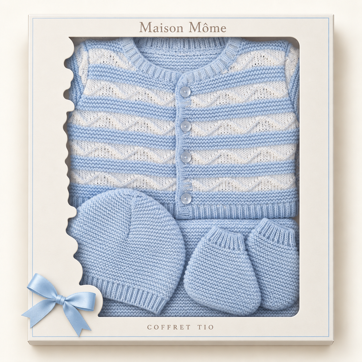 Coffret naissance TIO bleu ciel présenté dans sa boîte cadeau Maison Môme