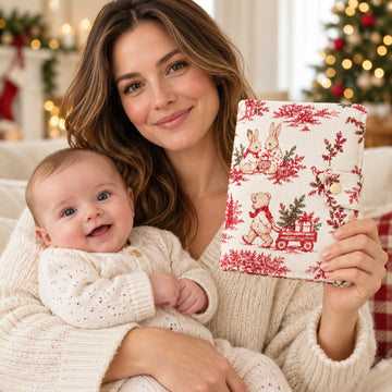 Protège carnet de santé Noël — avec bébé, visuel généré
